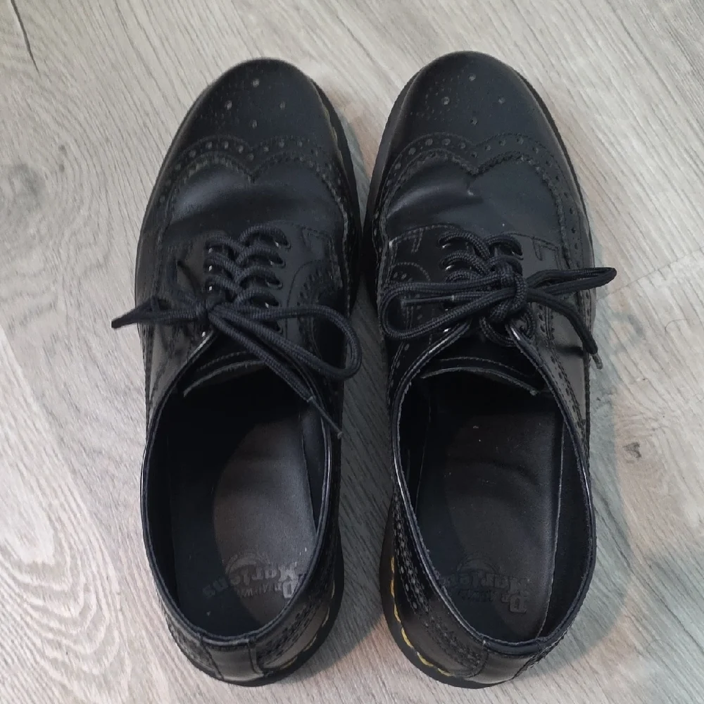 Dr. Martens Black Leather Wingtip Oxfords with Yellow Stitching